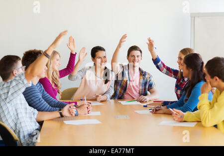 group of smiling students voting Stock Photo