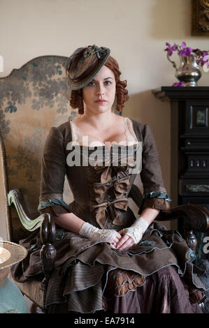 Young woman in old fashioned dress Stock Photo
