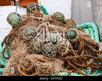 Antique Glass Fishing Net Floats on Glass Table Stock Photo - Alamy
