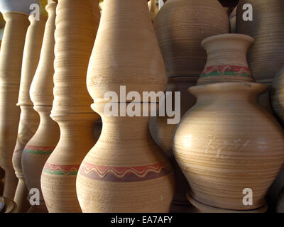 Many earthen pots kept for drying in the sun Stock Photo