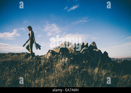 Women walking among rocks Stock Photo