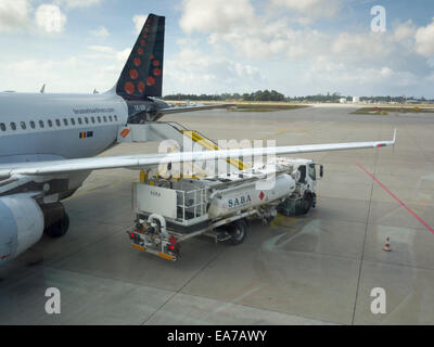 Refueling the plane at the airport. Gas tank hatch. Fuel tank. Copy space  Stock Photo - Alamy