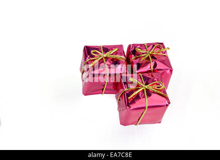Red gift boxes Christmas decorations isolated on white Stock Photo