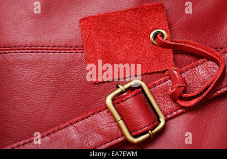 Red leather and a label for background Stock Photo
