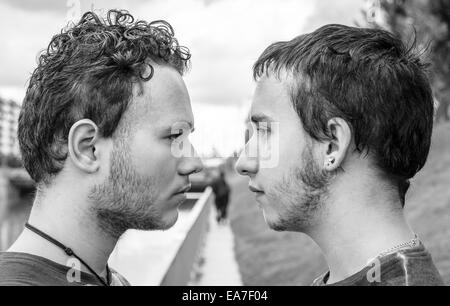 Loving gay couple in outsite Stock Photo