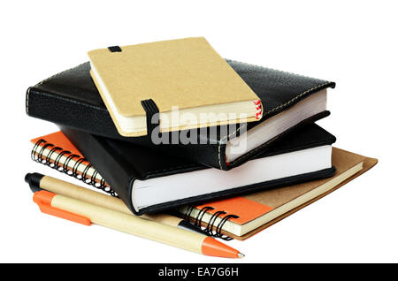 Stack of notebooks and pens Stock Photo