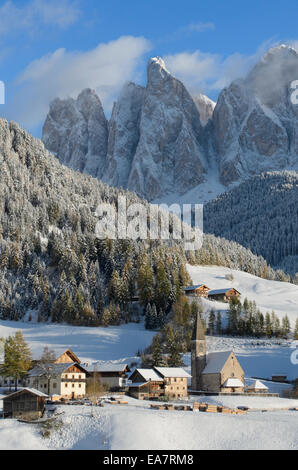 The church of St. Magdalena or Santa Maddalena, a village in front of the Geisler  dolomites mountain peaks in the Val di Funes. Stock Photo