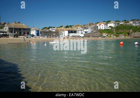 View from quayside looking back across the water to Gorran Haven beach at high tide on a sunny summers morning Restormel Mid Cor Stock Photo