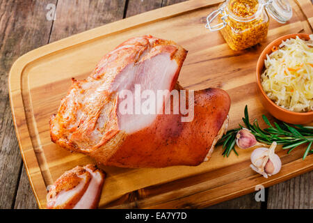 Baked pork shank with sauerkraut Stock Photo