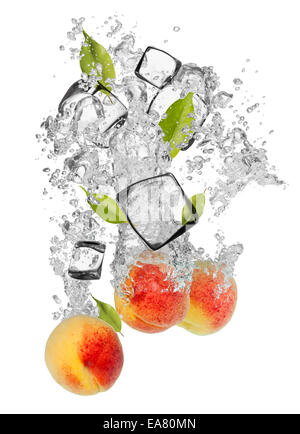 Falling pieces of apricots in water splash and ice cubes, isolated on white background Stock Photo