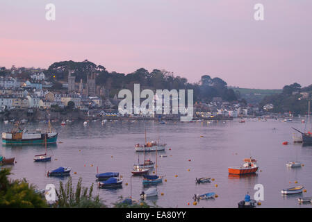 Dusk view from Polruan looking across the River Fowey to the town of Fowey Caradon South East Cornwall South West England UK Stock Photo