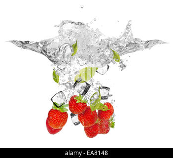 Falling pieces of nectarines in water splash and ice cubes, isolated on white background Stock Photo