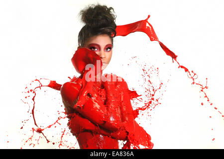 Beautiful Woman Covered in Bright Paint Splatter Stock Photo