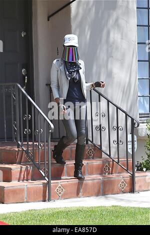 V. Stiviano leaving her home wearing her trademark visor  Featuring: V Stiviano Where: Los Angeles, California, United States When: 06 May 2014 Stock Photo