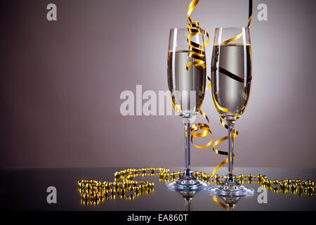 Glasses of champagne with ribbons Stock Photo