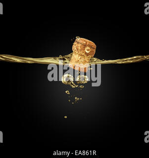 Cork of champagne in splash, isolated on black background Stock Photo