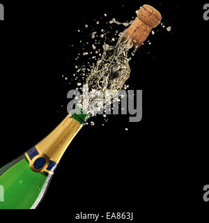 Bottle of champagne with splash on black background Stock Photo