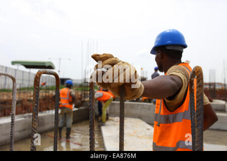 Construction Workers taking a break at the building site Stock Photo