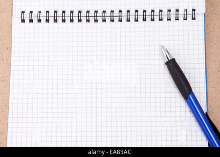 blue and black pen on binder pad Stock Photo
