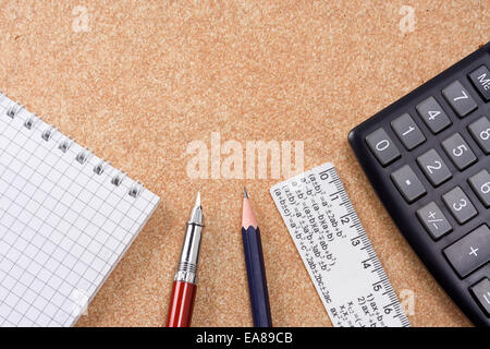 pad, ruler and pens on table Stock Photo