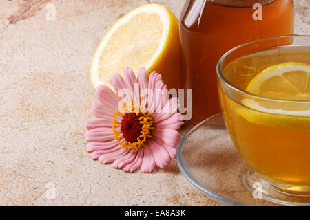 flower, tea and lemon on wood Stock Photo