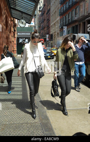 Kylie and Kendall Jenner walking in Soho  Featuring: Kylie Jenner,Kendall Jenner Where: Manhattan, New York, United States When: 06 May 2014 Stock Photo