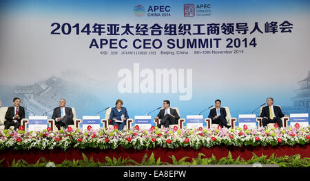 Beijing, China. 9th Nov, 2014. Chairman of Asia Inc Forum Timothy Ong, Global Chairman of PricewaterhouseCoopers International Ltd. Dennis Nally, Chilean President Michelle Bachelet, Director-General of World Trade Organization (WTO) Roberto Azevedo, Chairman of COFCO Corporation Frank Ning, and Chairman and CEO of Caterpillar Inc. Doug Oberhelman (L-R) attend the opening of the 2014 Asia-Pacific Economic Cooperation (APEC) CEO Summit in Beijing, capital of China, Nov. 9, 2014. © Jin Liwang/Xinhua/Alamy Live News Stock Photo