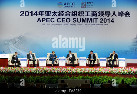 Beijing, China. 9th Nov, 2014. Chairman of Asia Inc Forum Timothy Ong, Global Chairman of PricewaterhouseCoopers International Ltd. Dennis Nally, Chilean President Michelle Bachelet, Director-General of World Trade Organization (WTO) Roberto Azevedo, Chairman of COFCO Corporation Frank Ning, and Chairman and CEO of Caterpillar Inc. Doug Oberhelman (L-R) attend the opening of the 2014 Asia-Pacific Economic Cooperation (APEC) CEO Summit in Beijing, capital of China, Nov. 9, 2014. © Luo Xiaoguang/Xinhua/Alamy Live News Stock Photo