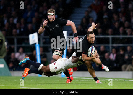 London, UK. 8th Nov, 2014. England's Semesa Rokoduguni tackles New Zealand's Israel Dagg - QBE Autumn Internationals - England vs New Zealand. Credit:  Cal Sport Media/Alamy Live News Stock Photo