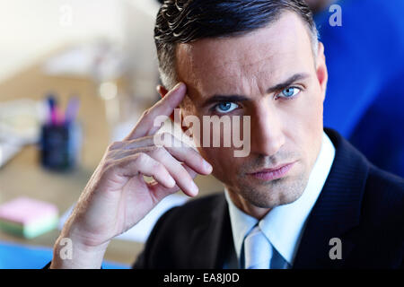 Portrait of a confident serious businessman Stock Photo