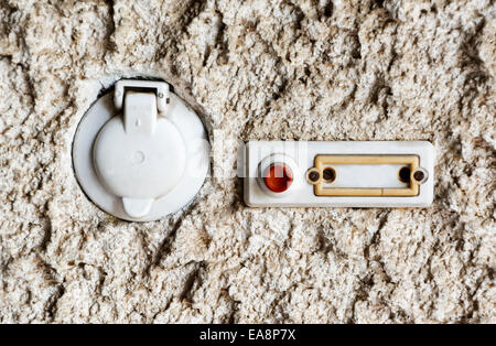 Front Door bell and light switch. Stock Photo