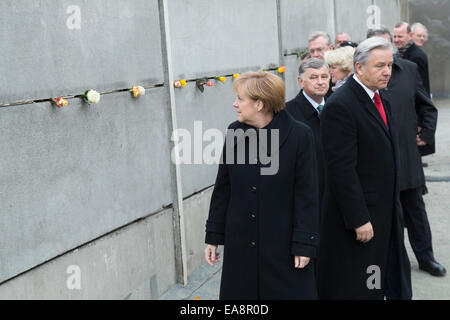Chancellor Angela Merkel (CDU),and Klaus Wowereit  between others celebrits laying roses at Berlin Wall Memorial at the 25th anniversary of the fall of the Berlin Wall on November 9th, 2014 in Berlin, Germany. / picture: Stock Photo