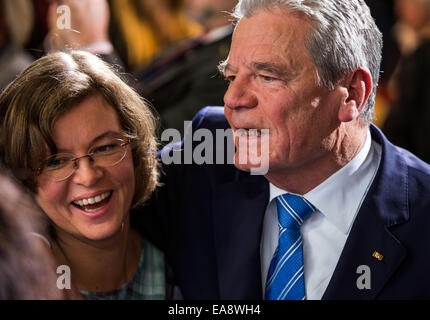 Schwerin, Germany. 09th Nov, 2014. German President Joachim Gauck (R) meets his daughter Gesine Lange (L), who left the GDR to move to the Federal Republic, at the taping of a round of talks on the occasion of the 25th anniversary of the fall of the Berlin Wall at the NDR broadcasting center in Schwerin, Germany, 09 November 2014. Many contemporary witnesses participated in the program hosted by Anne Will. It will be broadcast later in the ARD TV channel. PHOTO: JENS BUETTNER/dpa/Alamy Live News Stock Photo