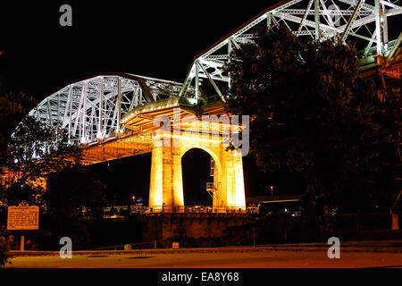 The Shelby Ave Pedestrian Bridge over the Cumberland River at night in Nashville TN Stock Photo