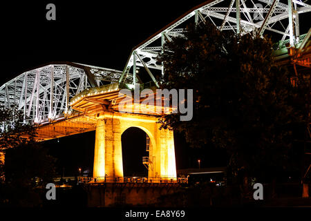 The Shelby Ave Pedestrian Bridge over the Cumberland River at night in Nashville TN Stock Photo