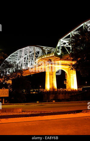 The Shelby Ave Pedestrian Bridge over the Cumberland River at night in Nashville TN Stock Photo