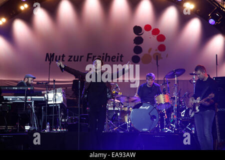 Berlin, Germany. 09th Nov, 2014. Clueso performs at the evening programme at the Brandenburg Gate to mark the 25th anniversary of German reunification on November 9th, 2014 in Berlin, Germany. Credit:  Reynaldo Chaib Paganelli/Alamy Live News Stock Photo