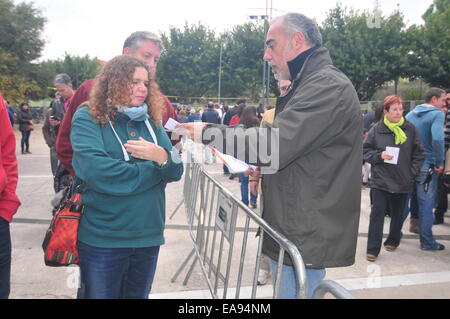 Catalonia Consultation Day -Referendum- (Sant Cugat Barcelona, Nov. 9th, 2014) Volonteer hepling voters Stock Photo