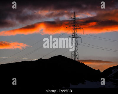 High voltage line in Valle de Braulio. Italy Stock Photo - Alamy