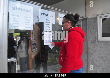 Catalonia Consultation Day -Referendum- (Sant Cugat Barcelona, Nov. 9th, 2014) Voter checking his voting table Stock Photo