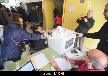 Catalonia Consultation Day -Referendum- (Sant Cugat Barcelona, Nov. 9th, 2014) Handicapped lady voting Stock Photo