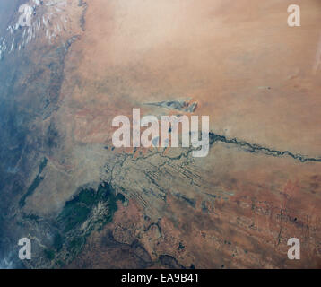 Region where the Niger and other rivers flow out of the wetter, more vegetated Sahel into the Sahara Desert. Africa Stock Photo