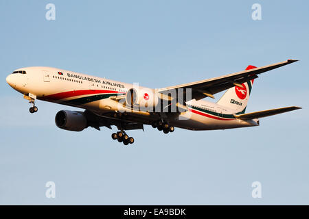 Biman Bangladesh Airlines Boeing 777-200 approaches runway 27R at London Heathrow Airport. Stock Photo