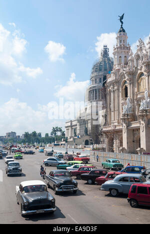 Vintage American automobiles from the 1950s make up the majority of traffic on the Paseo del Prado in Havana Cuba Stock Photo