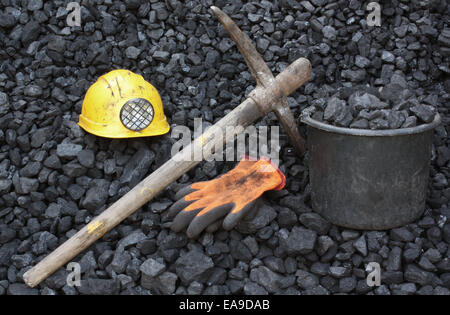 Mining tools on a background of coal Stock Photo