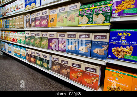 Boxes of Back To Nature brand crackers and other cracker brands shelves of a natural foods store. Stock Photo