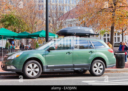 Auto rooftop cargo carrier on car - USA Stock Photo