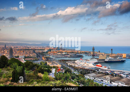 View from Montjuic hill over city of Barcelona at sunset in Catalonia, Spain.