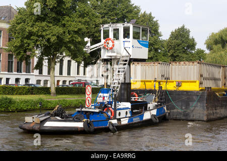 Transport of containers on the Rijn-Schie Canal in The Netherlands. The ...
