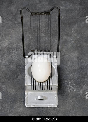 Boiled Egg in Vintage Slicer Stock Photo